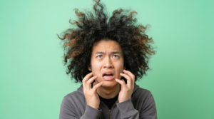 The “Hover Diffuse” Method: How to Set Tight Curls Without Generating Frizz